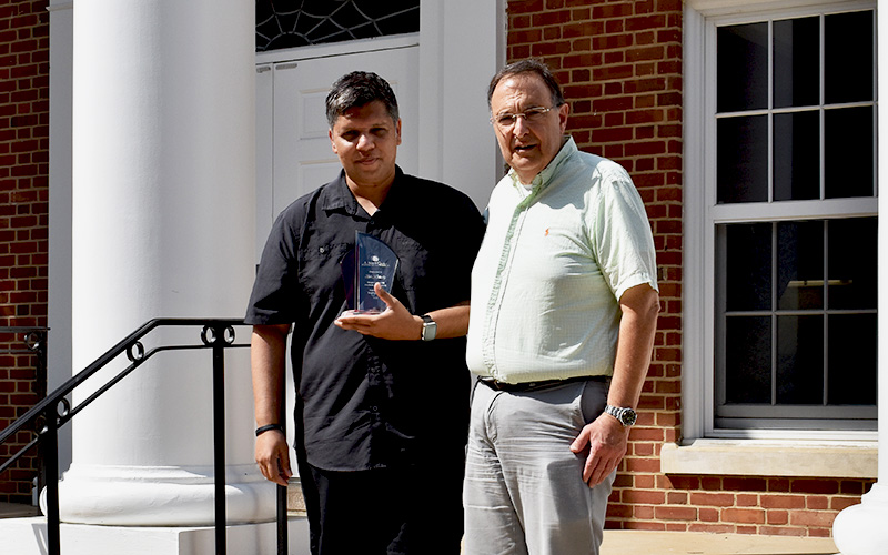 Zeid Kootbally and George Syrmos with the OTA plaque